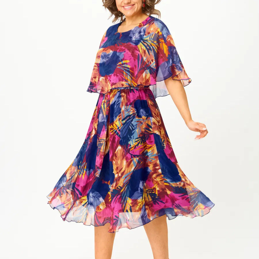 Vibrant floral print women's flowy midi dress, perfect for summer casual chic or elegant occasion wear.