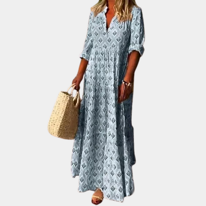 Vibrant Isla flowing maxi summer dress for women, perfect breezy vacation wear. Comfortable & stylish.