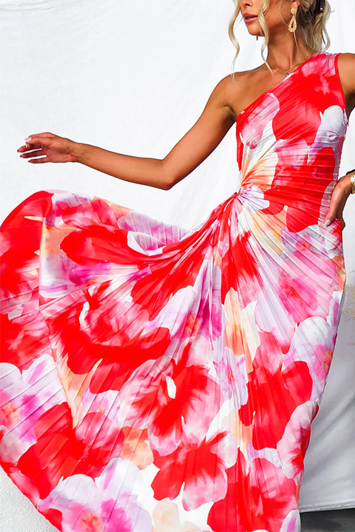 Vibrant printed one-shoulder evening gown for women, featuring a flowy asymmetric hem. Elegant special occasion dress.