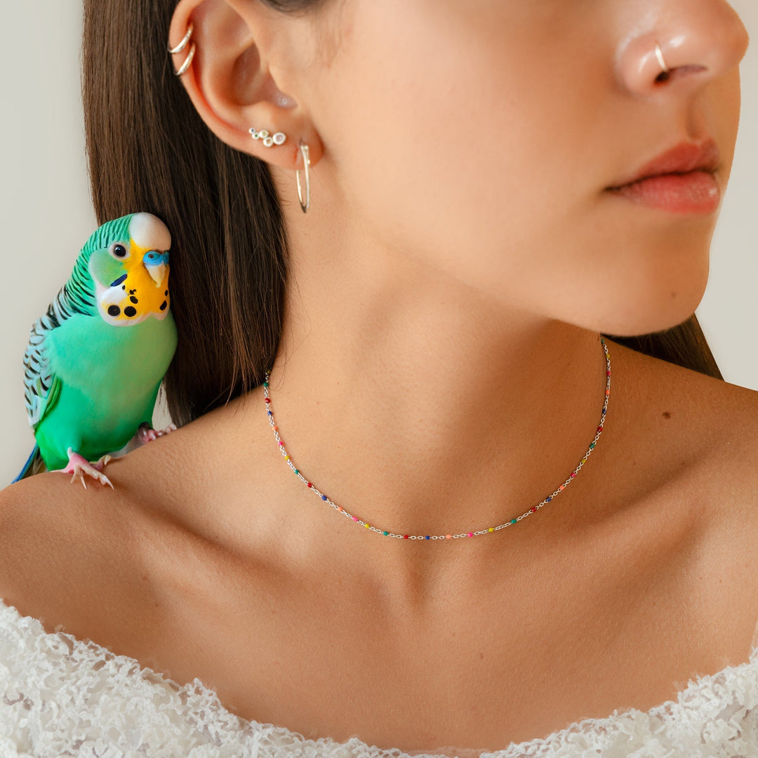 Women's fashion rainbow necklace, gold plated with colorful beads, a stylish & adjustable accessory.