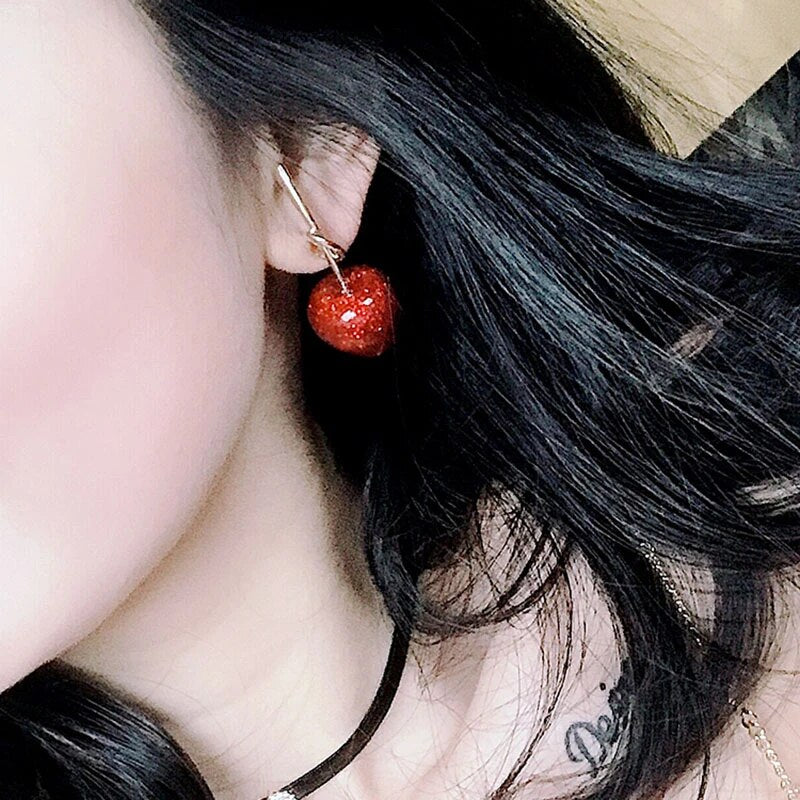 Gold-plated red cherry dangle earrings, elegant design, ideal vibrant women's fashion statement.