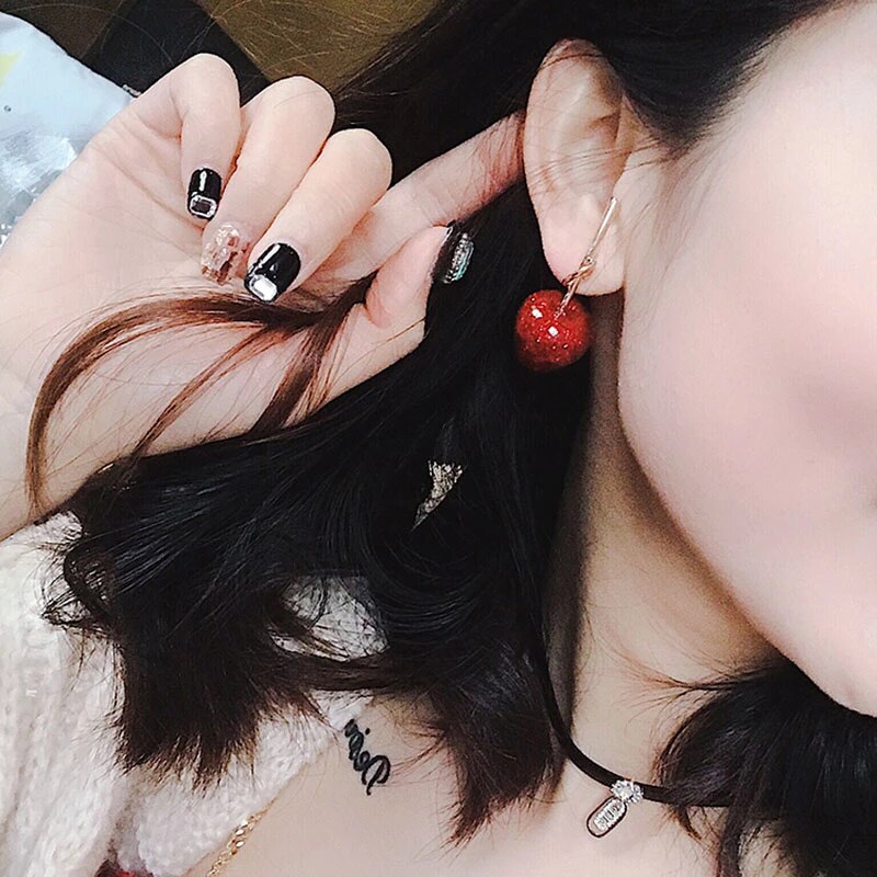 Vivid red cherry drop earrings, a must-have statement piece for any women's jewelry collection.