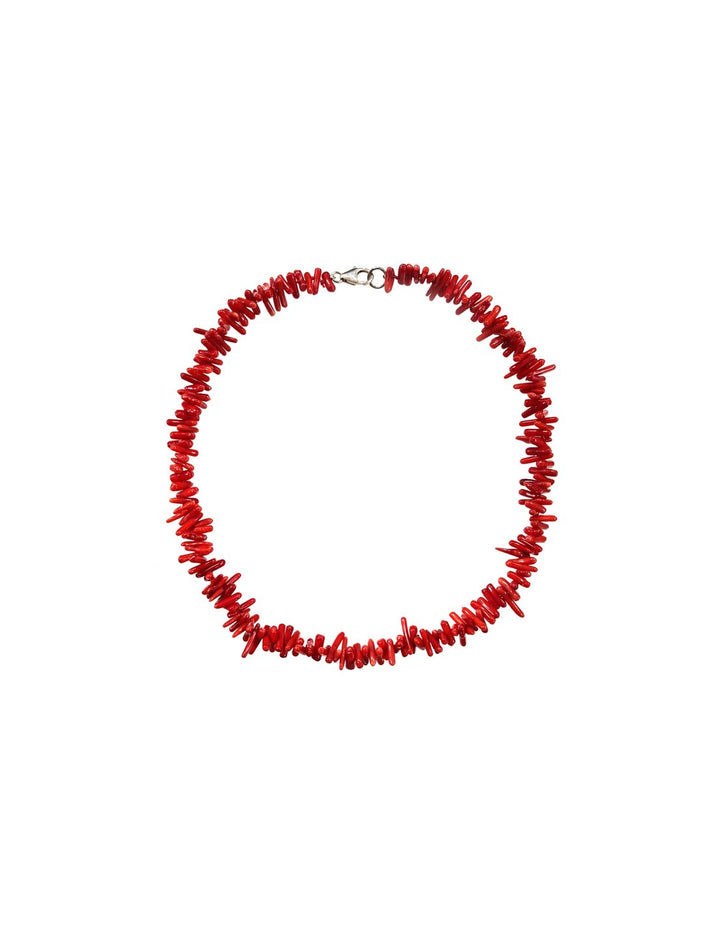 Stylish women's vibrant red coral beaded necklace. A beautiful gemstone jewelry piece and elegant fashion accessory.