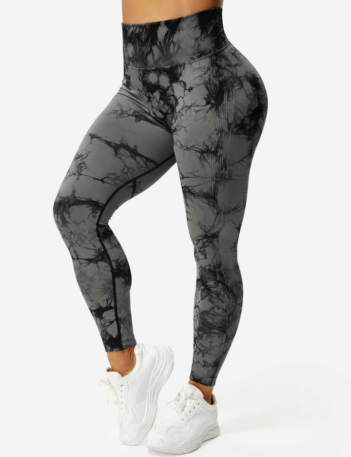 Vibrant tie-dye women's leggings, perfect for yoga, workouts & ultimate comfort.