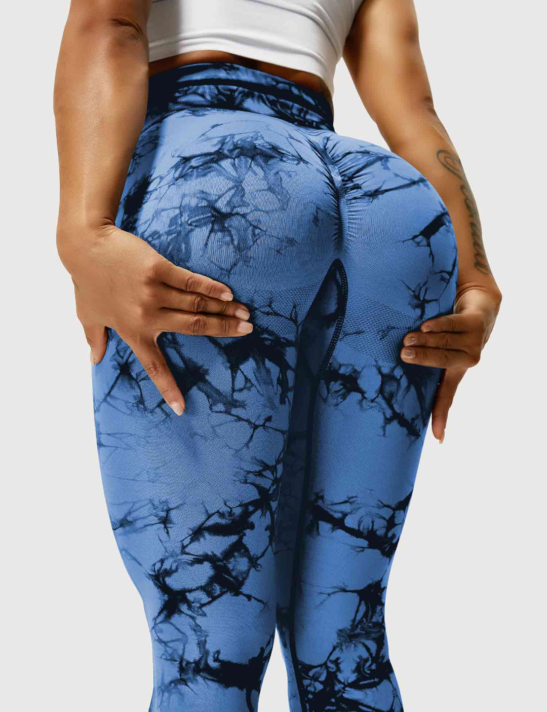 Stylish tie-dye fitness leggings for women, vibrant colors & comfortable fit.