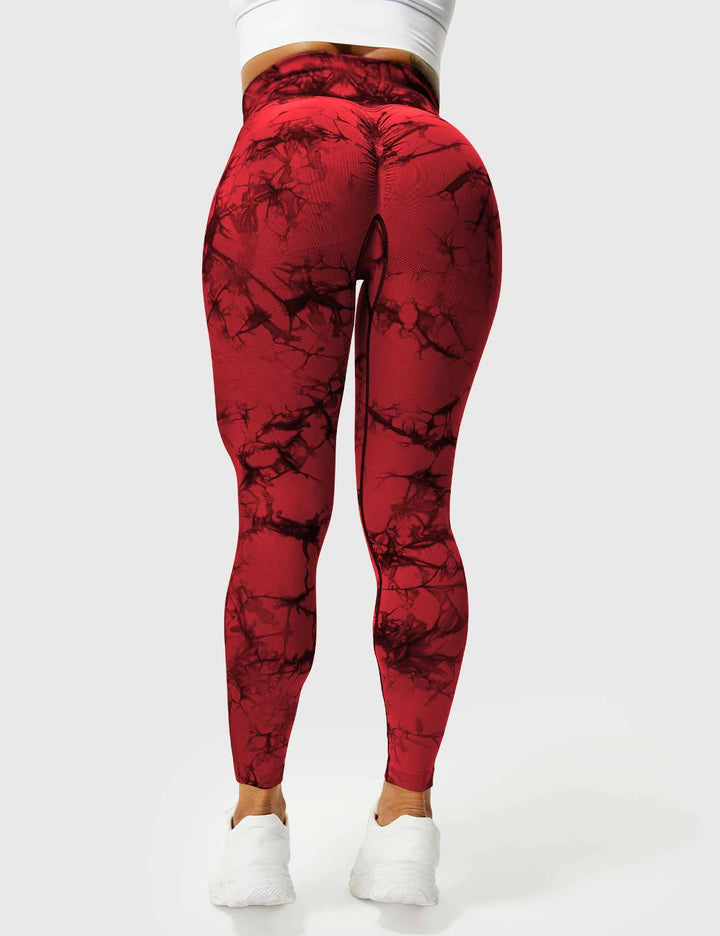 Women's stylish tie-dye workout leggings, vibrant and high-performance activewear.