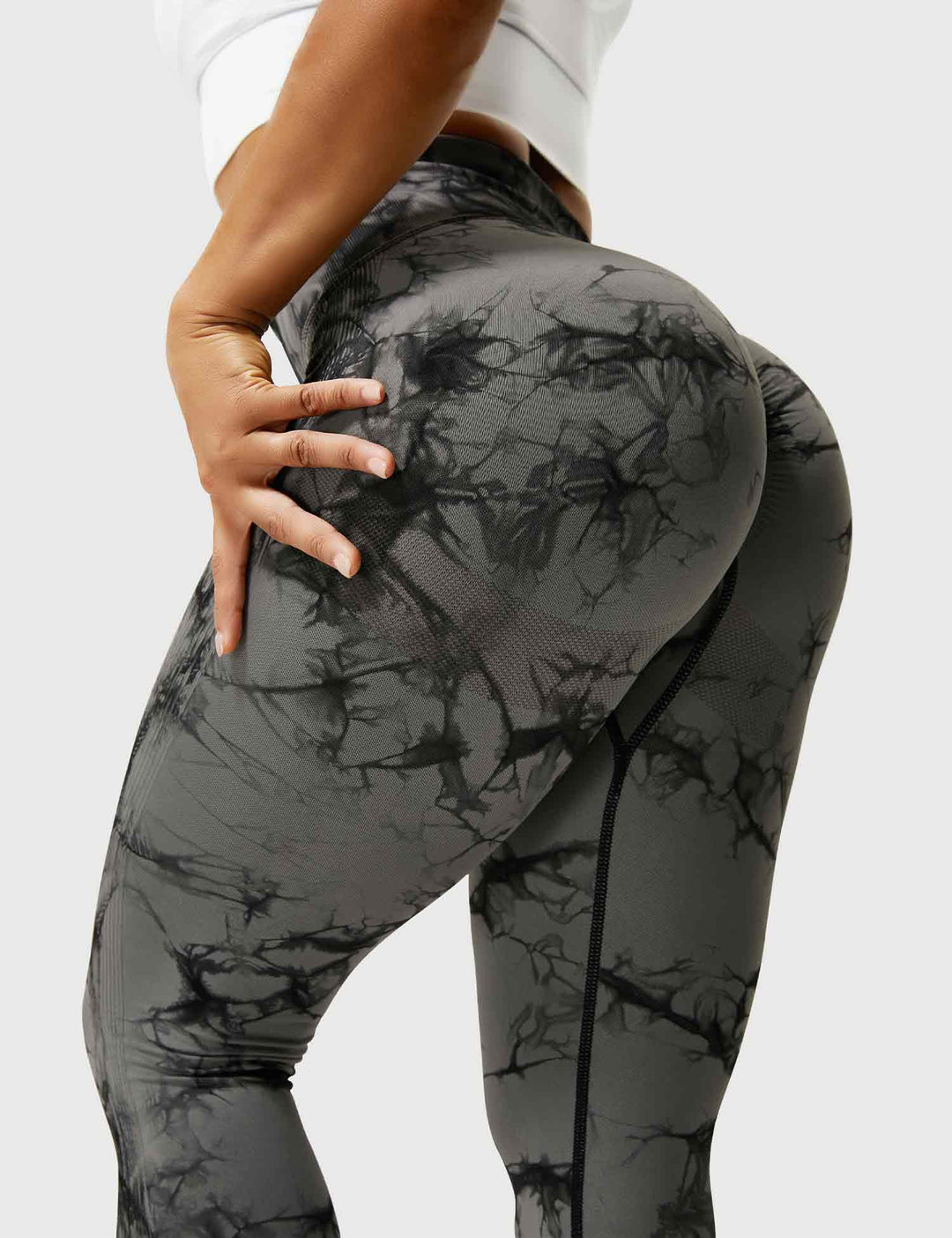 Women's comfortable tie-dye yoga pants, vibrant for athleisure & active lifestyles.
