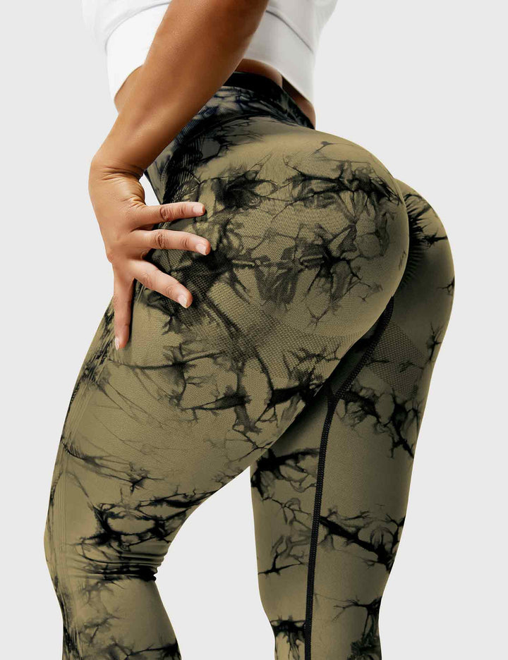 Women's stylish tie-dye workout leggings, comfortable & vibrant for fitness.