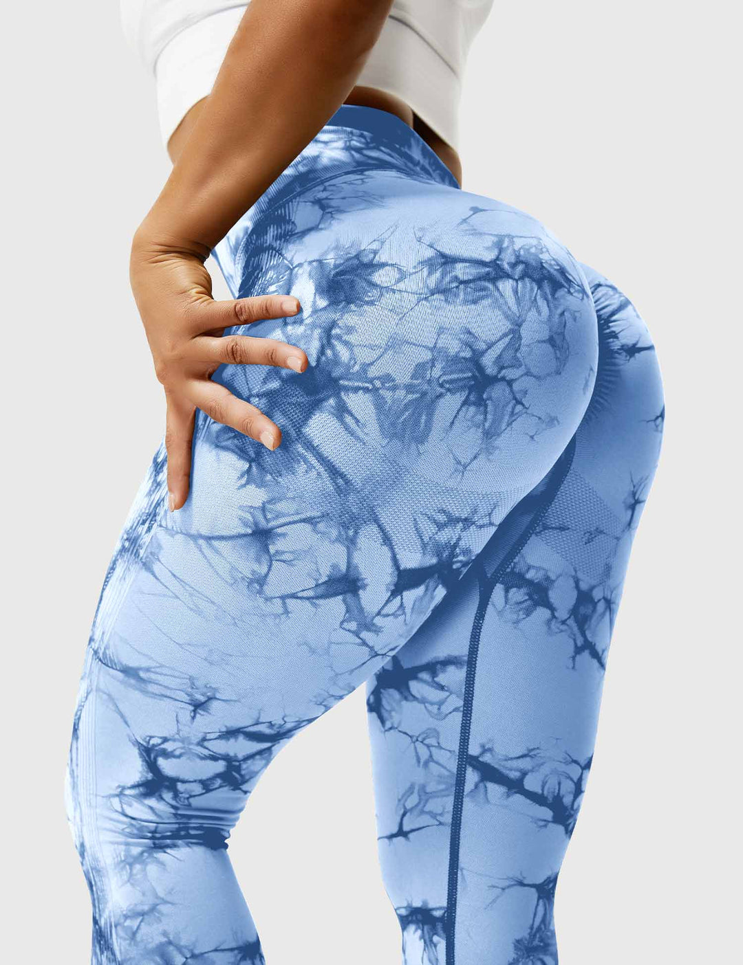 Women's vibrant tie-dye activewear, comfortable leggings for yoga & fitness.