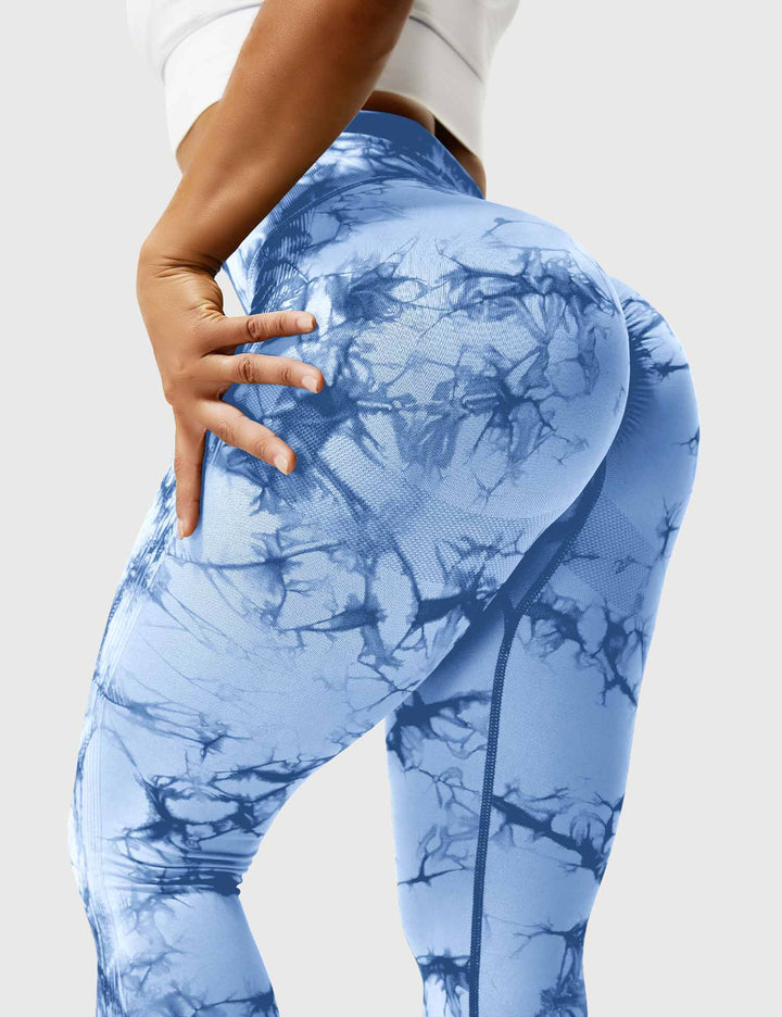 Women's vibrant tie-dye activewear, comfortable leggings for yoga & fitness.