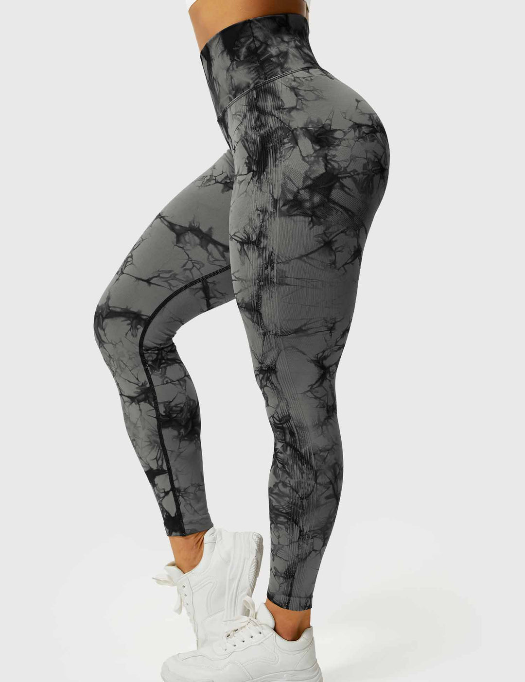 Fashionable tie-dye women's activewear, vibrant leggings for yoga & fitness.