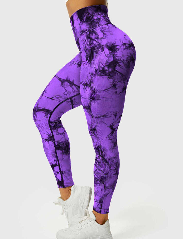 Women's vibrant tie-dye yoga leggings, soft & perfect for active lifestyles.