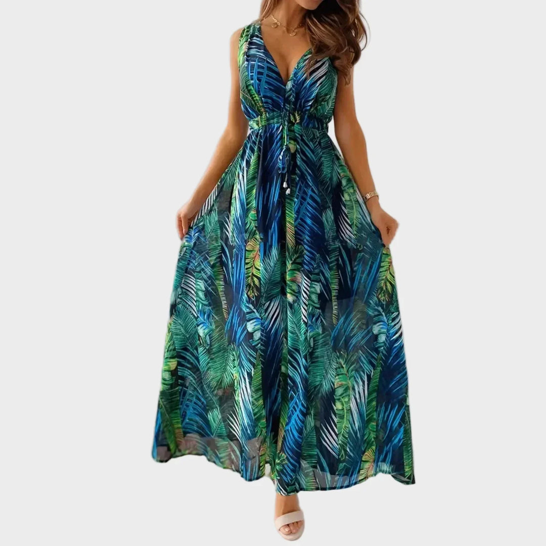 Women's long tropical floral print summer dress, ideal for vacation outfits and beachwear. Features a flattering V-neck.