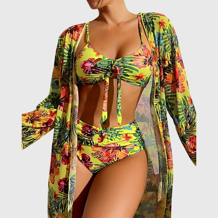 Vibrant tropical print women's two-piece bikini swimsuit. Perfect beachwear & poolside style for summer vacation.