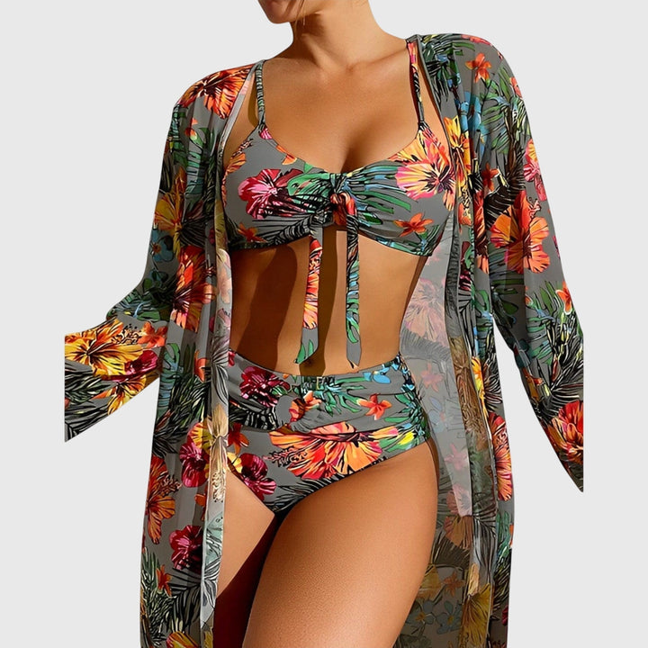 Stylish women's tropical botanical print bikini. Flattering two-piece swimsuit, ideal summer beachwear for vacation.