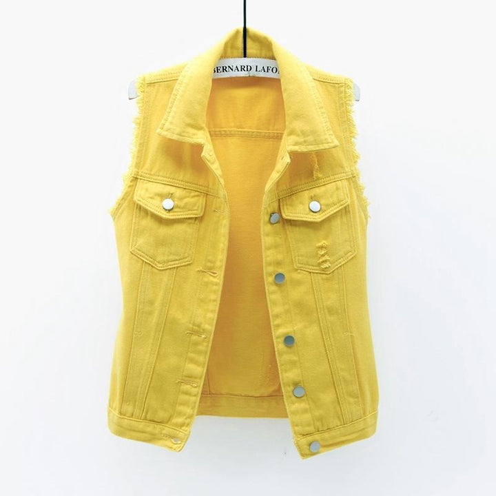Vibrant unisex denim statement vest with colorful patches, perfect for streetwear fashion and expressive layering.
