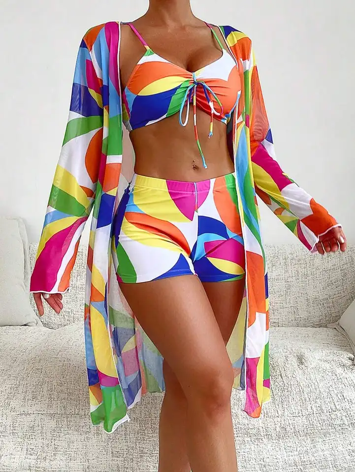 Vibrant women's 3-piece swim set with mesh cover-up, ideal beachwear & resort style for summer fashion.