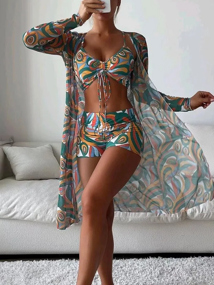 Cabana women's 3-piece swim set: vibrant bathing suit, high-stretch, with stylish mesh cover-up. Poolside.