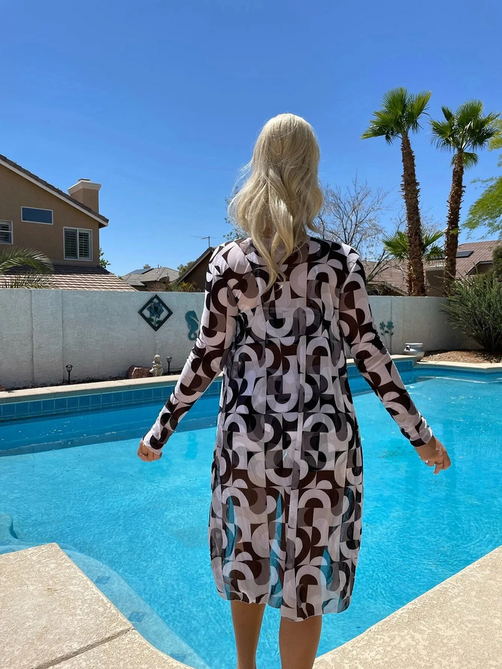 Front view of vibrant women's Cabana 3-piece swim set with cover-up, stylish for resort wear & beach.