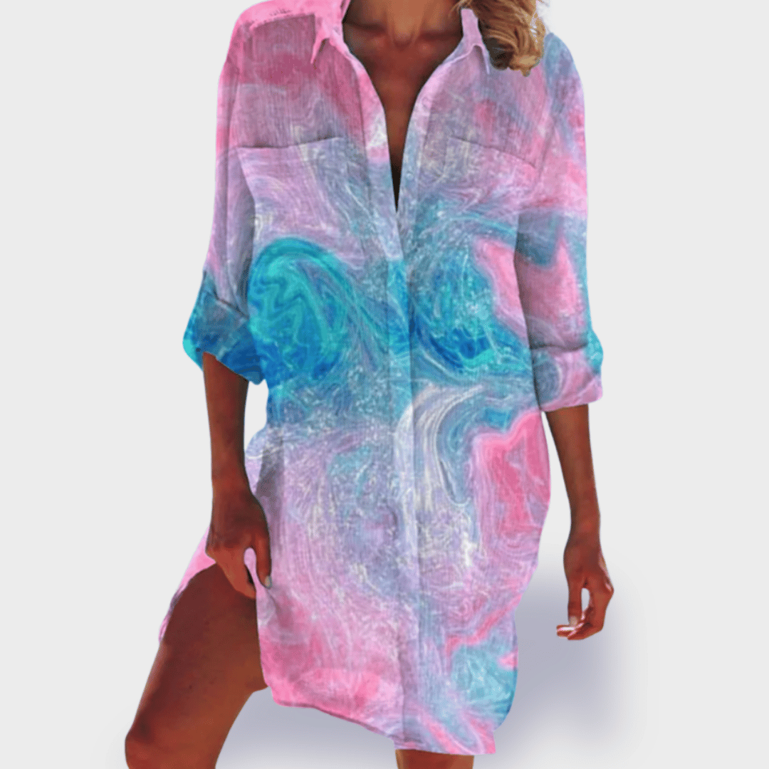 Summer style vibrant women's flowy draped dress. Elegant comfort, relaxed fit midi design, great for casual wear.