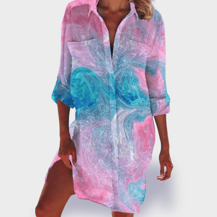 Summer style vibrant women's flowy draped dress. Elegant comfort, relaxed fit midi design, great for casual wear.