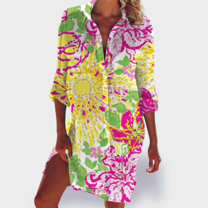 Comfortable vibrant women's flowy draped midi dress. Elegant design, perfect for relaxed summer style.