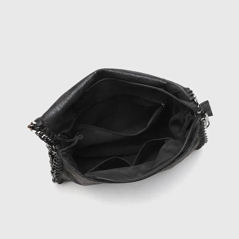Jett shoulder bag for women, a vintage-style gothic handbag in black. Essential everyday accessory.