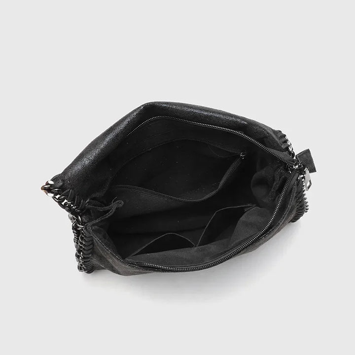 Jett shoulder bag for women, a vintage-style gothic handbag in black. Essential everyday accessory.