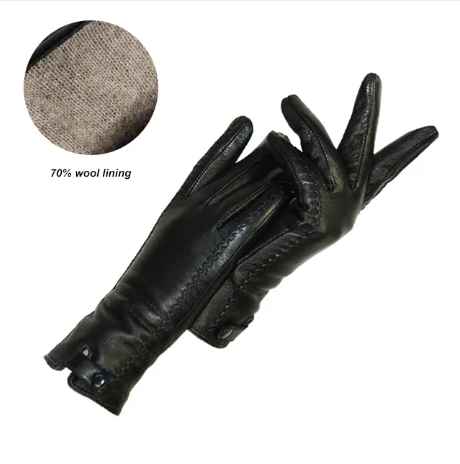 Warm women's vintage leather gloves with soft wool lining, ideal for winter. Comfortable cold weather fashion accessory.