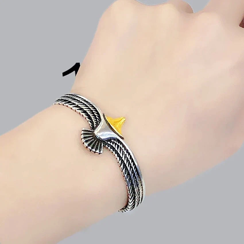Creative boho eagle bracelet for women, a vintage stainless steel statement jewelry piece. Adjustable & unique.