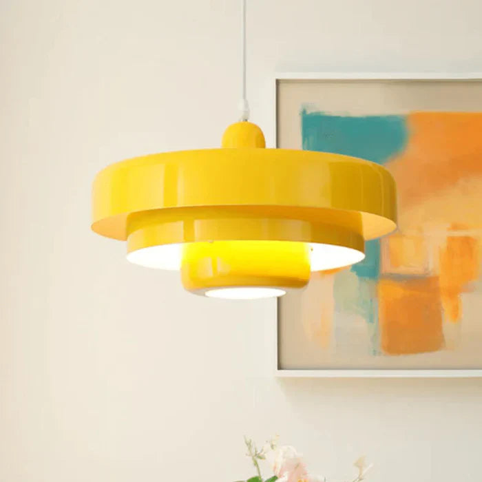 Room shot featuring multiple vintage industrial LED pendant lights over a dining table