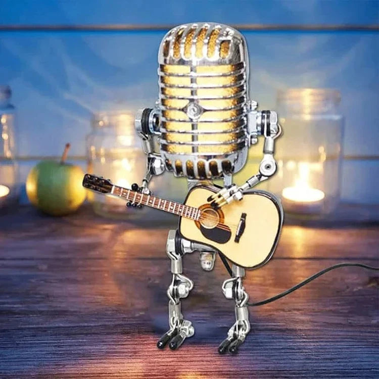 Vintage metal microphone robot guitar lamp, a unique art piece & desk decor for music lovers.