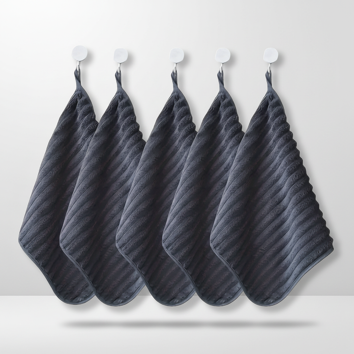 Detailed view of the striped pattern on a vintage kitchen towel, soft texture