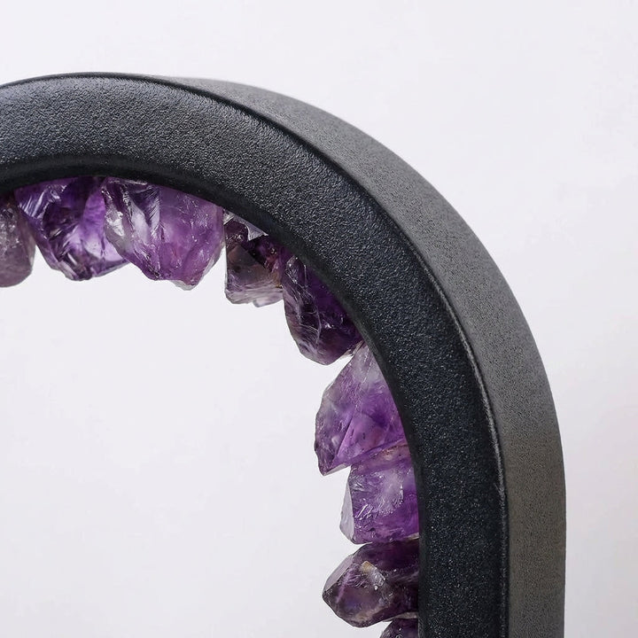 Decorative tabletop lamp with natural crystals, emitting a soothing light