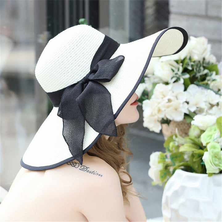 Fashionable Vivian wide-brim beach hat for women, providing excellent sun protection with a breathable design.