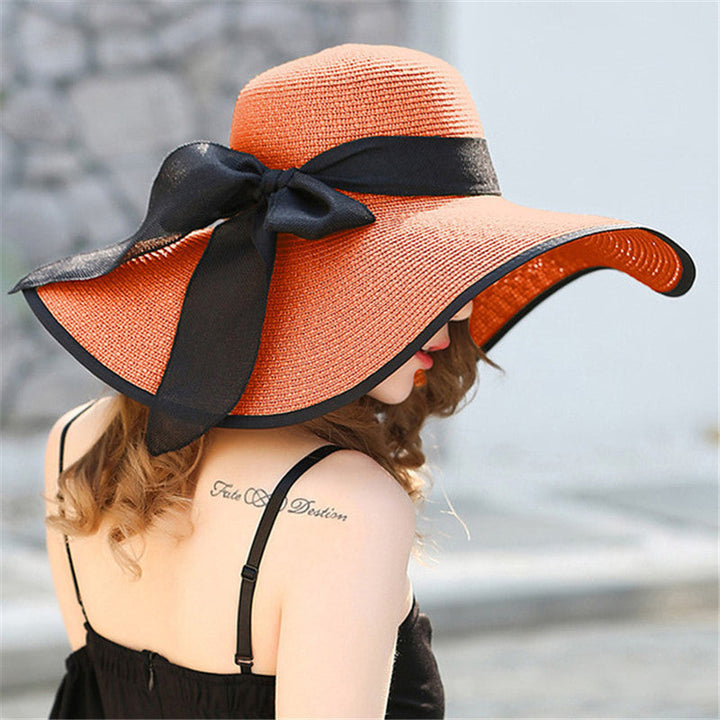 Lightweight Vivian sun hat for women, featuring a wide brim for beach days and outdoor sun protection.