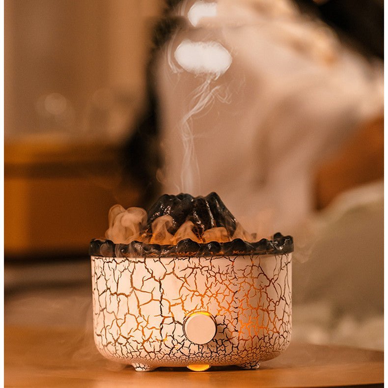 Quiet volcanic humidifier with LED eruption lighting. Disperses soothing mist & aromatherapy scents for home decor.
