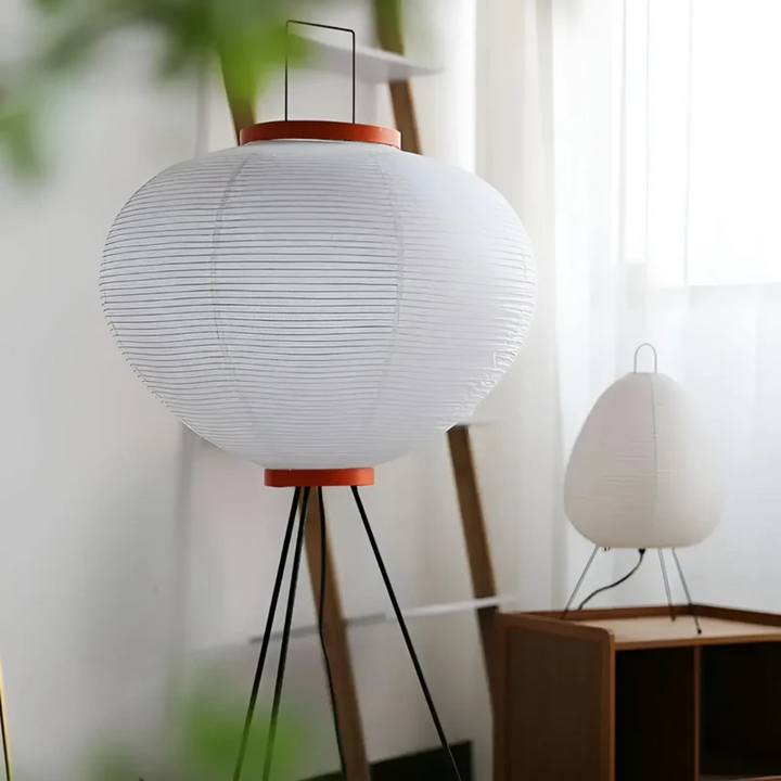 ZenAura Wabi-Sabi rice paper LED floor lamp providing a minimalist, tranquil light for any living room.