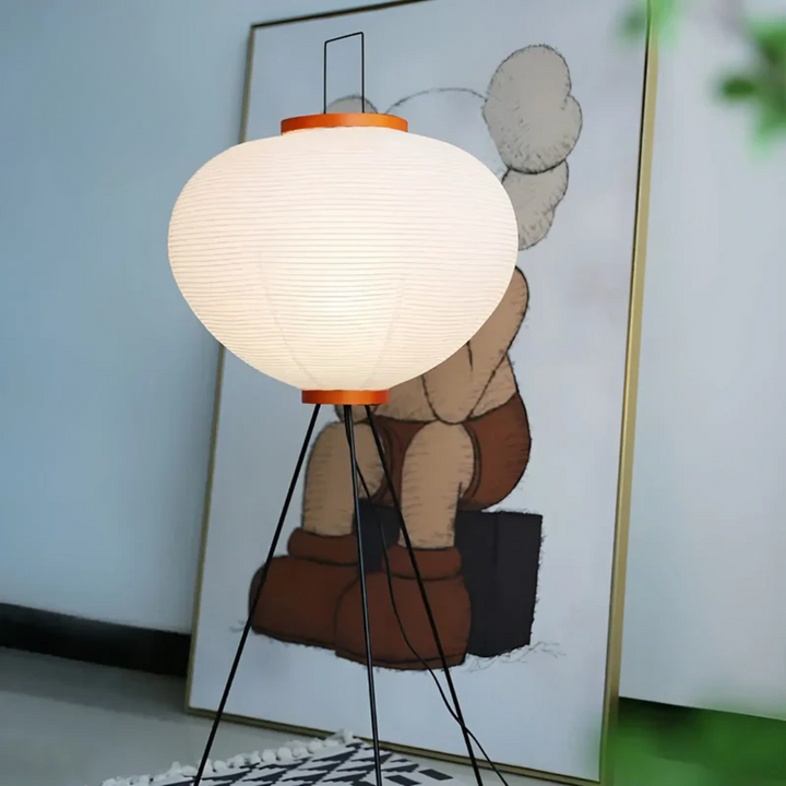 Stylish Wabi-Sabi LED floor lamp made from rice paper, offering tranquil ambient light for modern zen living spaces.