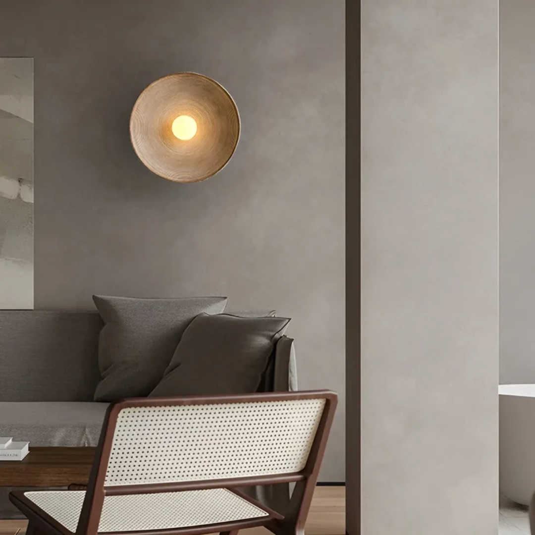 Wabi-Sabi wall lamp with serene modern disc design, providing tranquil ambient lighting for home decor.