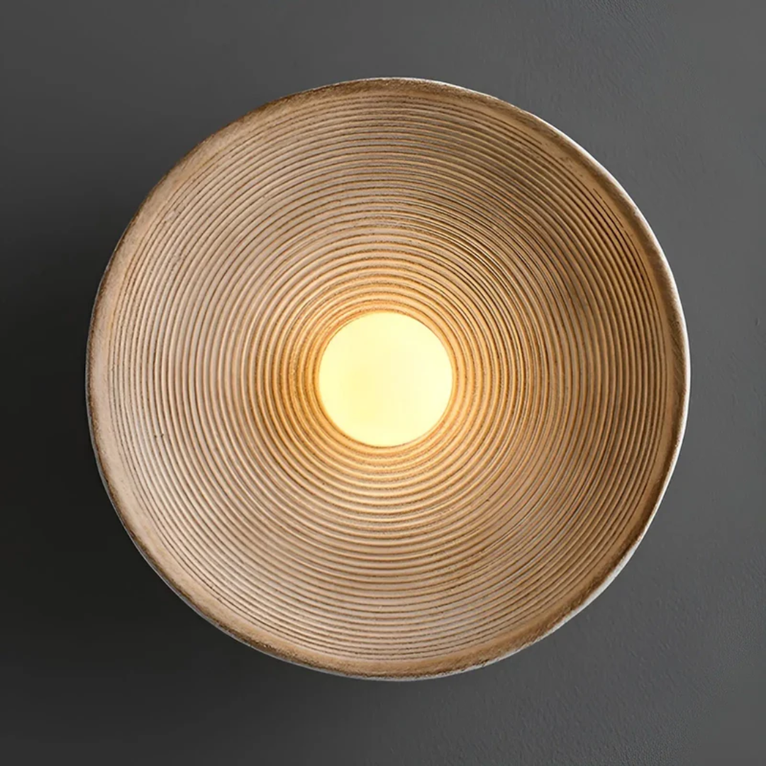 Serene Wabi-Sabi wall lamp, featuring a modern disc design for minimalist and ambient home lighting.
