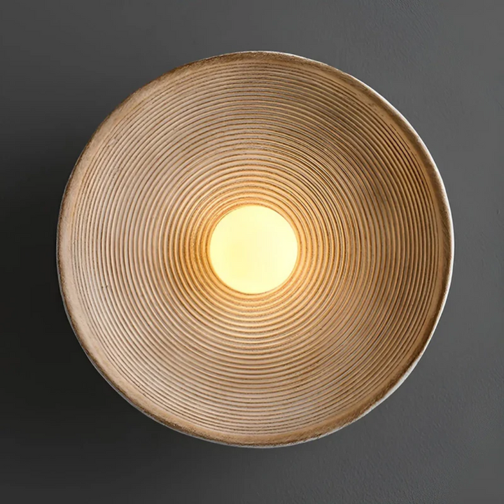 Serene Wabi-Sabi wall lamp, featuring a modern disc design for minimalist and ambient home lighting.