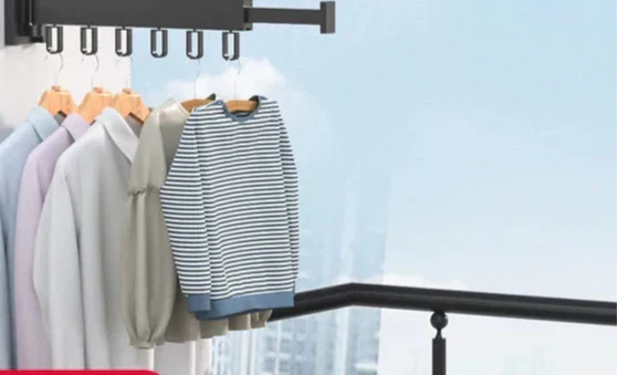 Space saving wall mounted laundry rack, retractable design for clothes drying in any room.