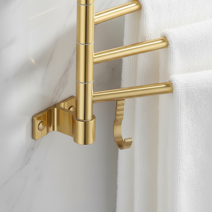 Modern gold triple arm towel holder, wall-mounted for stylish bathroom organization and space saving.