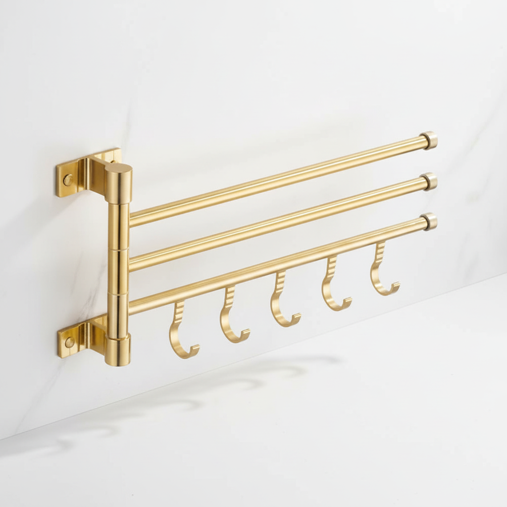 Functional and decorative gold aluminum towel rack, wall-mounted triple arm design for contemporary bathrooms.
