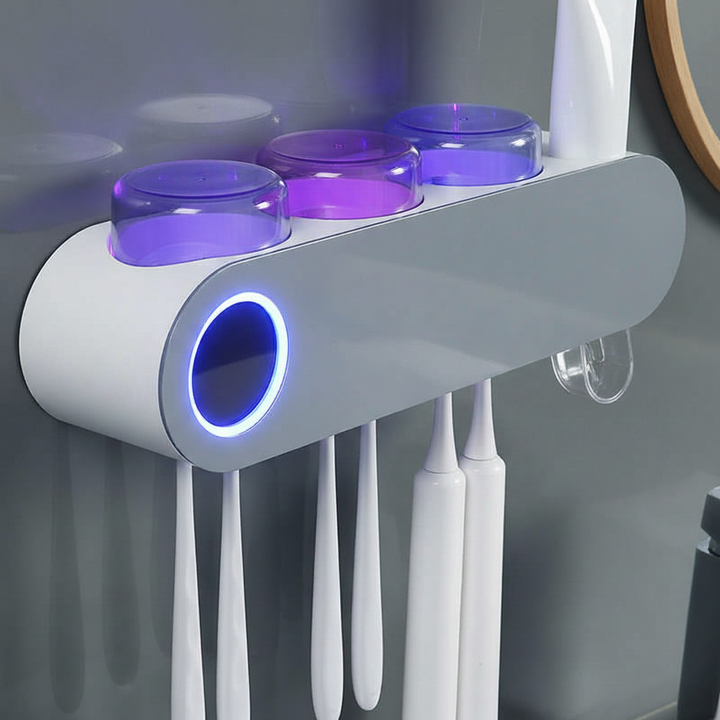 CleanLume UV toothbrush organizer mounted on a wall, ensuring oral care and hygiene for the family.