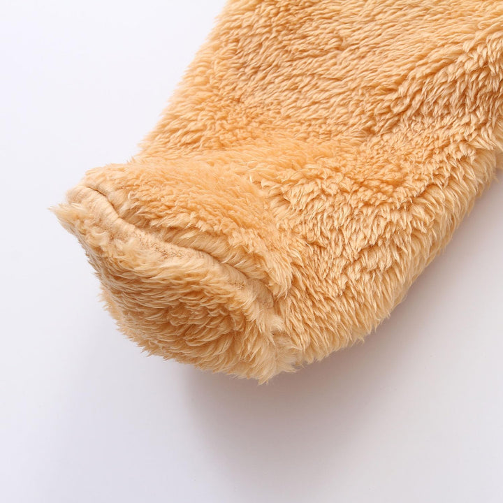 Warm baby romper with hood, a protective layer for cold climates