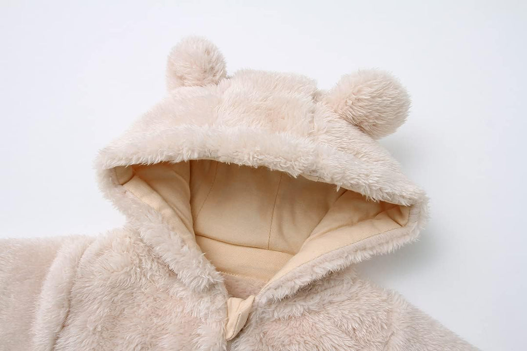 Soft hooded fleece romper for infants, provides gentle warmth and security