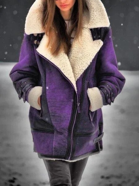 Fashionable women's sherpa jacket for ultimate warmth and comfort, a chic outerwear piece for cold weather.