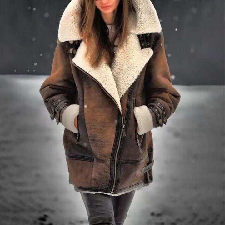 Soft textured women's sherpa jacket, a cozy and stylish choice for winter layering and comfortable fashion.